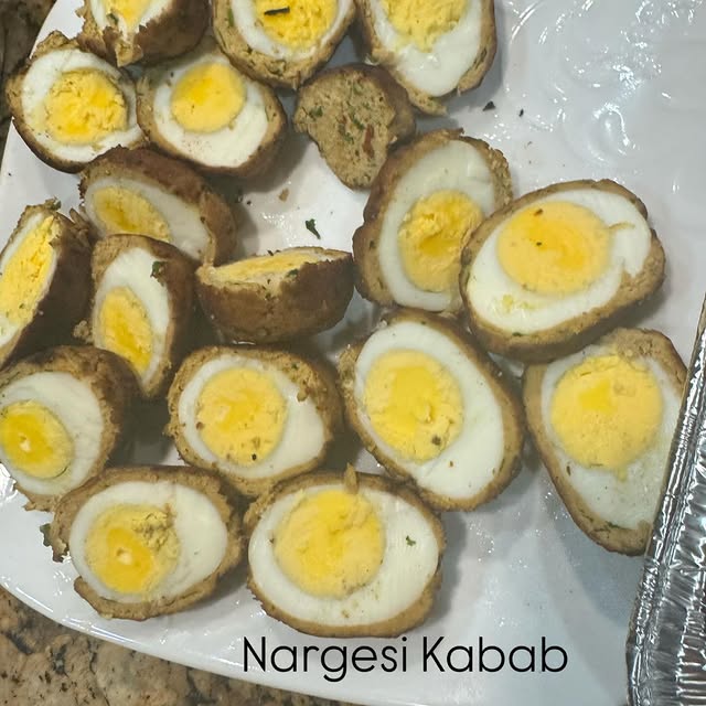 Nargesi kabab slices with a cooked egg center